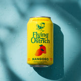 Yellow can of Flying Ostrich Mangogo on a blue background