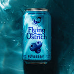 Blue can of Flying Ostrich Flyberry beer on a blue background