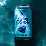 Blue can of Flying Ostrich Flyberry beer on a blue background